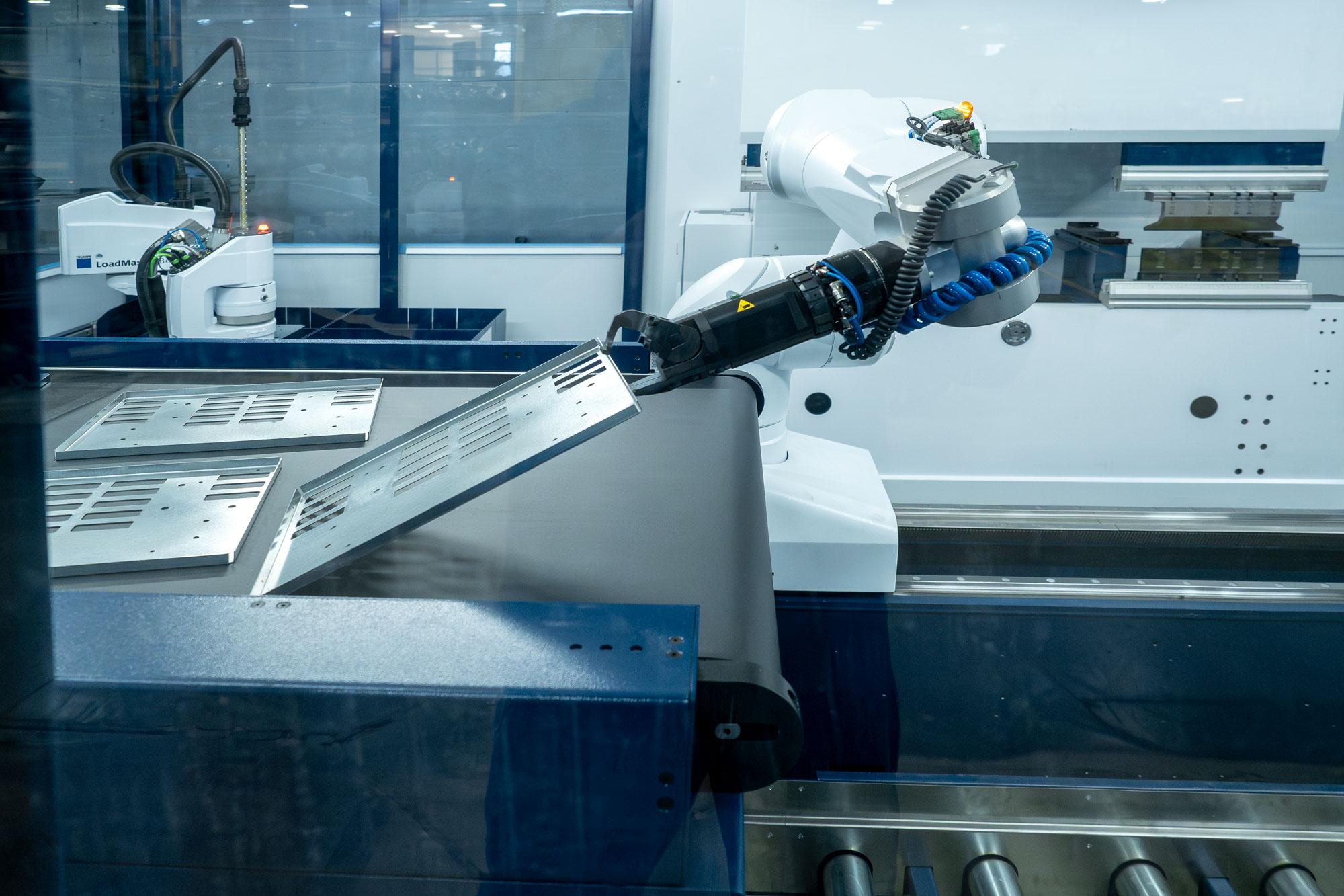TruBend-robotic arm bending sheet metal at Kalow Technologies contract manufacturing